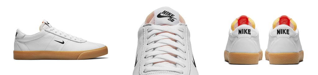 nike sb orange label bruin shoes full view, white leather, black nike swoosh, gum sole, white background