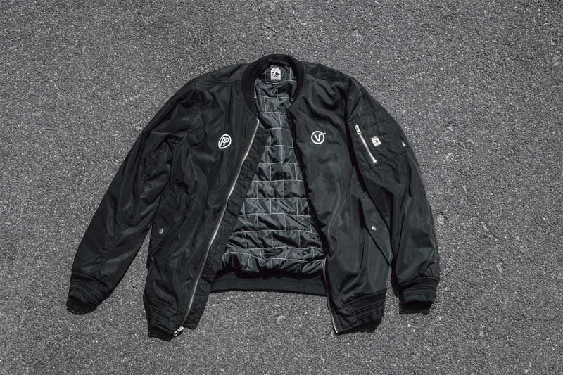 black bomber jacket, vans, pass~port, cement background