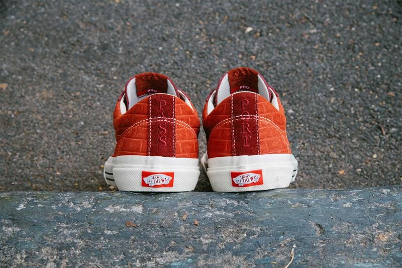 red vans shoes , back view, white sole , red vans logo